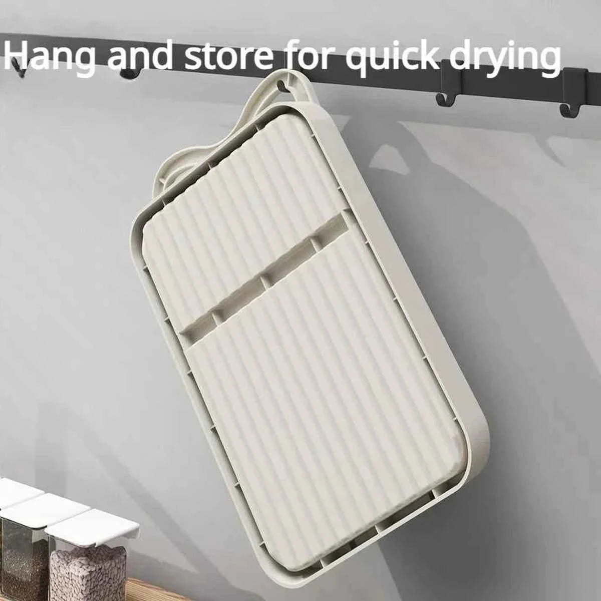 Support silicone chat plié à plat pour un rangement gain de place dans un tiroir de cuisine